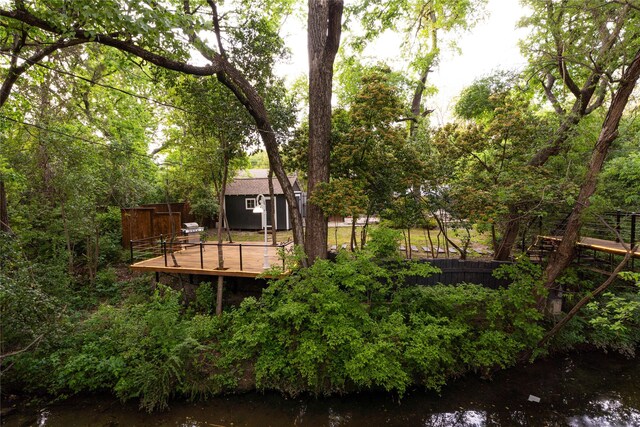 1711 Tamarack Dr, Dallas, TX 75228 - view of yard featuring a deck with water view