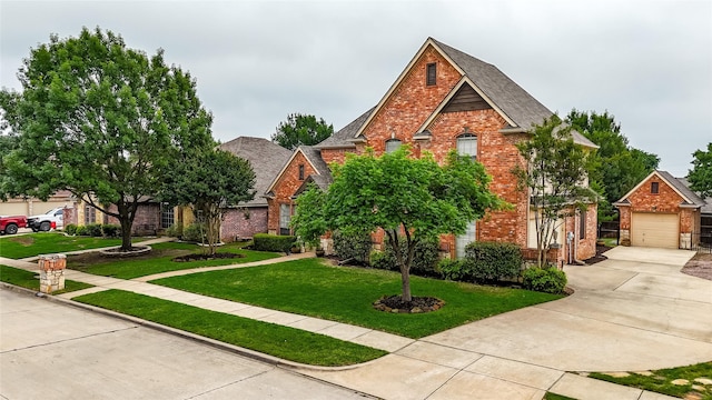 view of front of property with an outdoor structure, concrete driveway, and brick siding