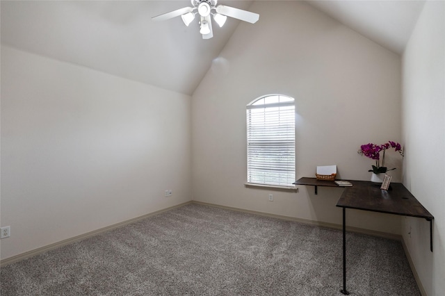 interior space with baseboards, ceiling fan, and vaulted ceiling