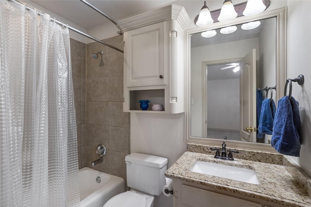 full bathroom featuring vanity, shower / tub combo with curtain, and toilet