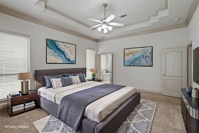 7816 Shady Oaks Dr, North Richland Hills, TX 76182 - bedroom featuring a raised ceiling, multiple windows, light colored carpet, ornamental molding, and a ceiling fan