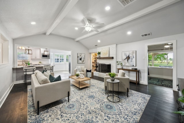 living area with visible vents, baseboards, ceiling fan, dark wood-style floors, and vaulted ceiling with beams