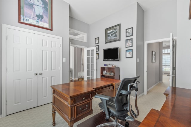 4009 Fairfax Ct, Flower Mound, TX 75028 - office area featuring light colored carpet, a high ceiling, baseboards, and french doors