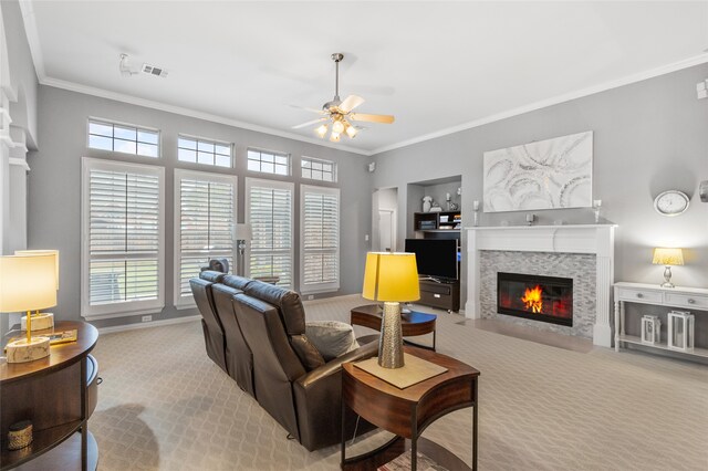 4009 Fairfax Ct, Flower Mound, TX 75028 - living area featuring carpet, ornamental molding, ceiling fan, a fireplace with flush hearth, and baseboards