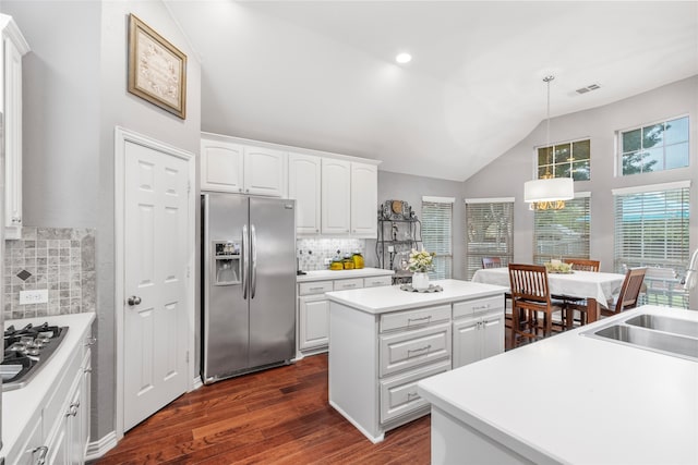 4009 Fairfax Ct, Flower Mound, TX 75028 - kitchen featuring stainless steel appliances, a sink, a center island, tasteful backsplash, and dark wood-style floors