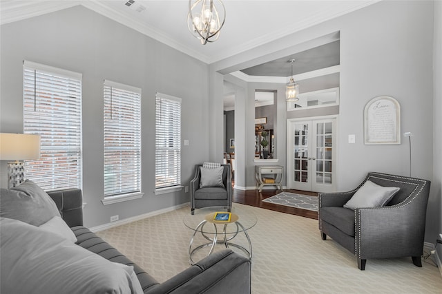 4009 Fairfax Ct, Flower Mound, TX 75028 - living room with a chandelier, ornamental molding, carpet, baseboards, and french doors
