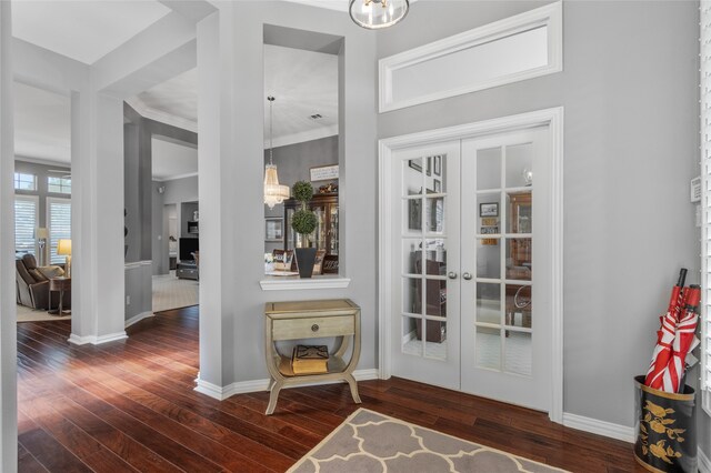 4009 Fairfax Ct, Flower Mound, TX 75028 - entrance foyer with french doors, wood-type flooring, baseboards, and ornamental molding