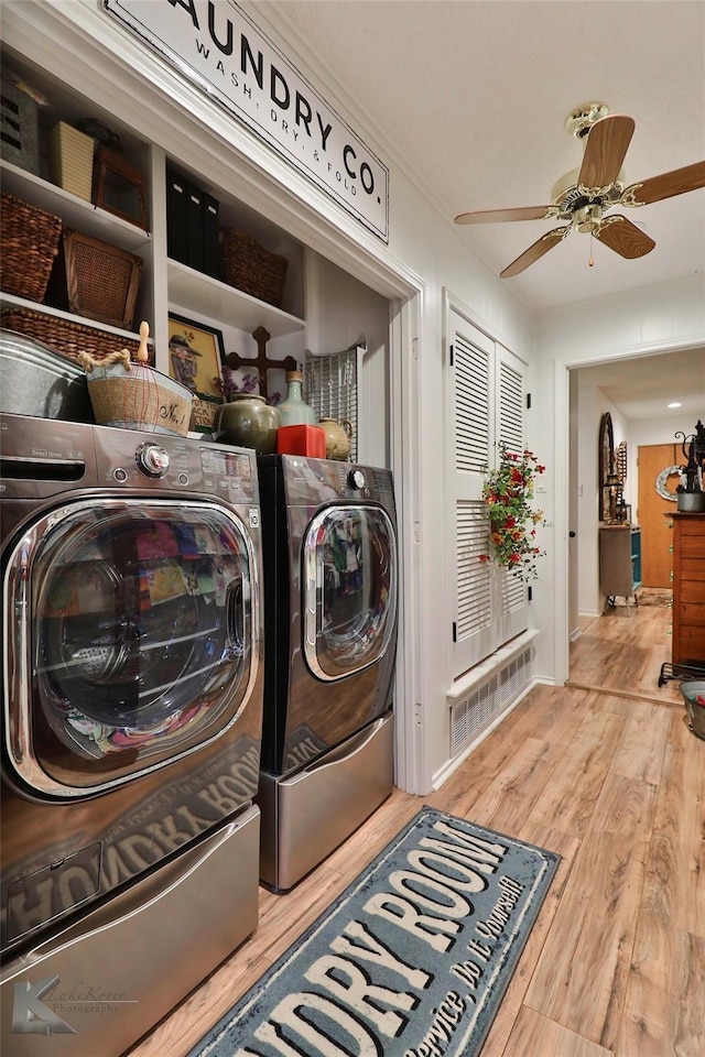 1929 S 13th St, Abilene, TX 79602 - laundry area featuring baseboards, separate washer and dryer, ceiling fan, laundry area, and wood finished floors
