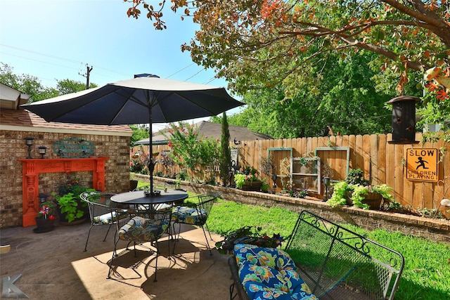 1929 S 13th St, Abilene, TX 79602 - view of patio with outdoor dining space and fence