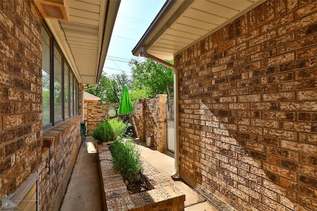 1929 S 13th St, Abilene, TX 79602 - view of home's exterior with fence and brick siding