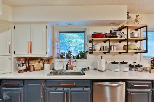 1929 S 13th St, Abilene, TX 79602 - bar with a sink, stainless steel dishwasher, and decorative backsplash