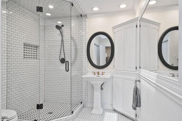 full bathroom with ornamental molding, a shower stall, tile patterned flooring, and recessed lighting