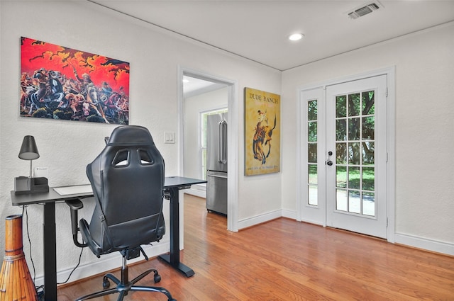home office with wood finished floors, baseboards, visible vents, and recessed lighting
