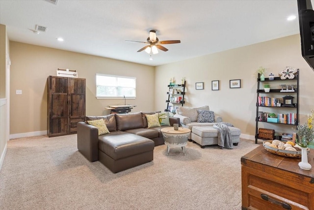 living room with a ceiling fan, baseboards, light colored carpet, and recessed lighting