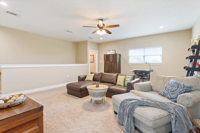 living room featuring carpet flooring, a ceiling fan, baseboards, recessed lighting, and visible vents