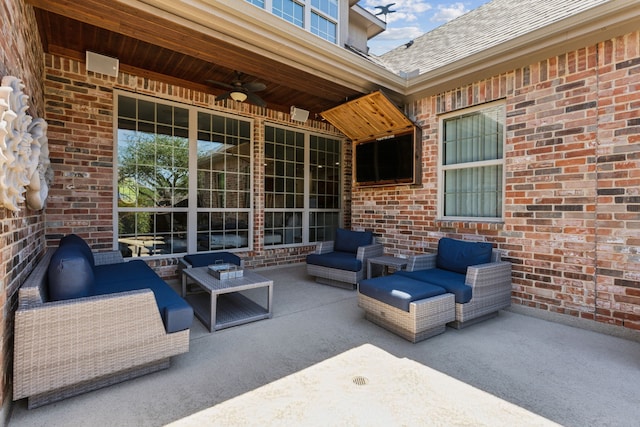 view of patio featuring outdoor lounge area and a ceiling fan