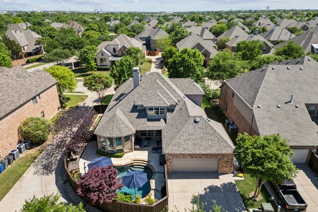 drone / aerial view with a residential view