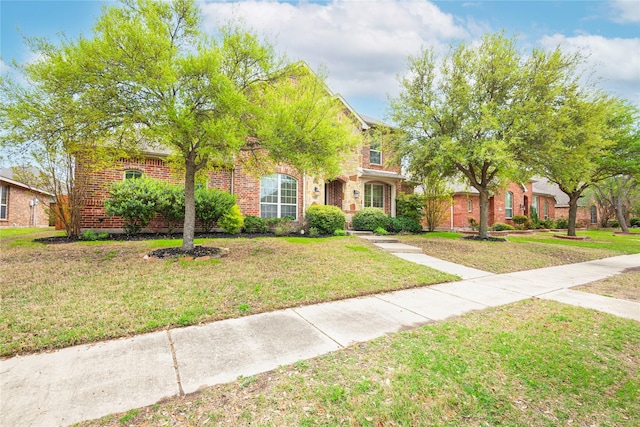 7014 Handen Dr, Rowlett, TX 75089 - view of front of house with a front lawn and brick siding