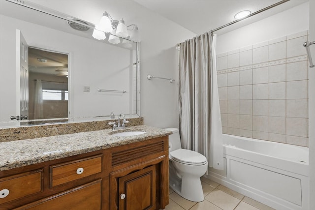 bathroom with tile patterned flooring, vanity, shower / tub combo with curtain, and toilet