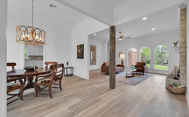dining room with recessed lighting, light wood-style floors, visible vents, and ceiling fan with notable chandelier