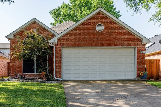 view of front of house featuring concrete driveway, a shingled roof, an attached garage, and brick siding