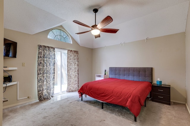 carpeted bedroom featuring baseboards, a ceiling fan, a textured ceiling, and vaulted ceiling