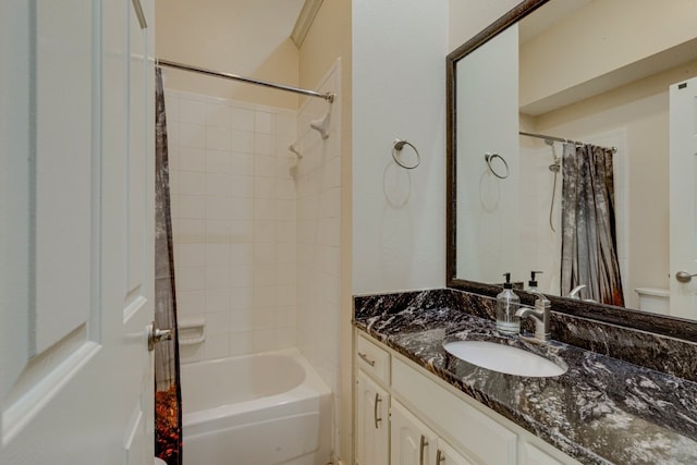 full bathroom featuring vanity and shower / bath combination with curtain