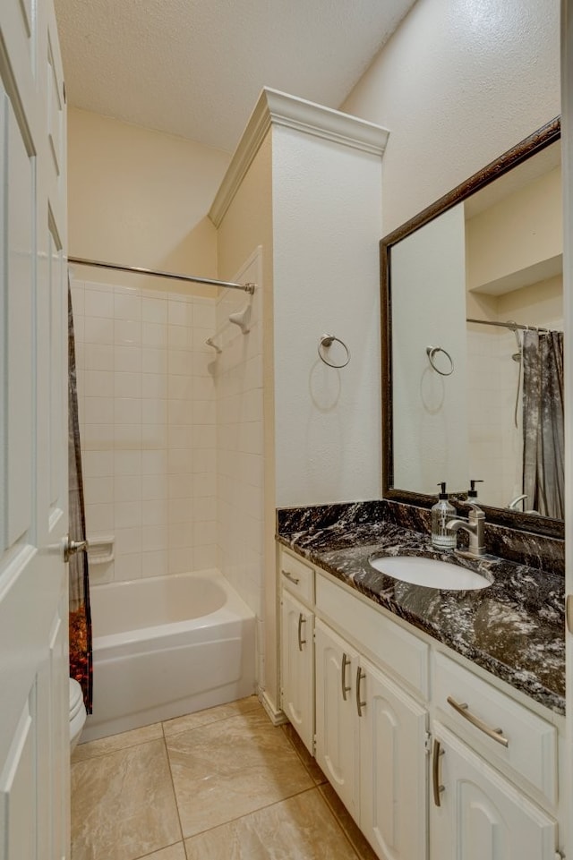 full bathroom featuring toilet, shower / bath combo, and vanity