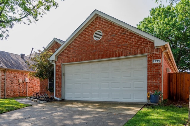 garage with fence
