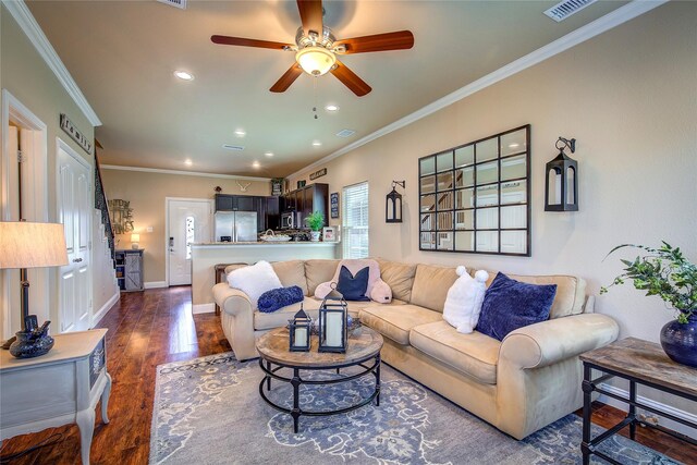 living area featuring recessed lighting, crown molding, dark wood-type flooring, visible vents, and ceiling fan