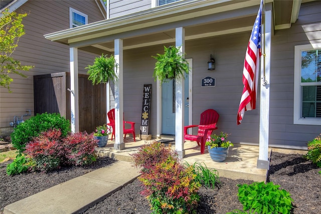 entrance to property featuring covered porch