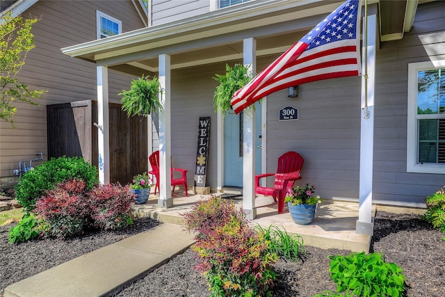 property entrance with covered porch