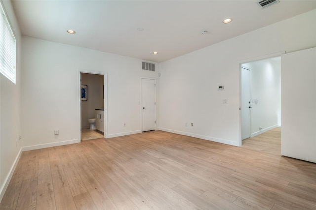 3251 Cambrick St Unit 13, Dallas, TX 75204 - unfurnished room featuring light wood finished floors, baseboards, and visible vents