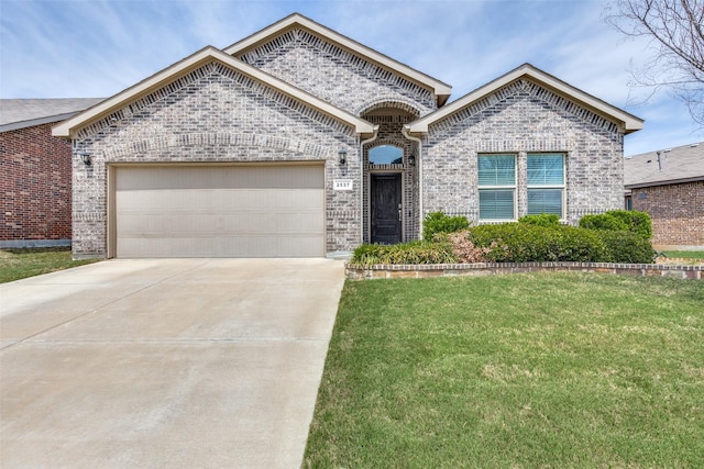 french country style house featuring concrete driveway, brick siding, and a garage