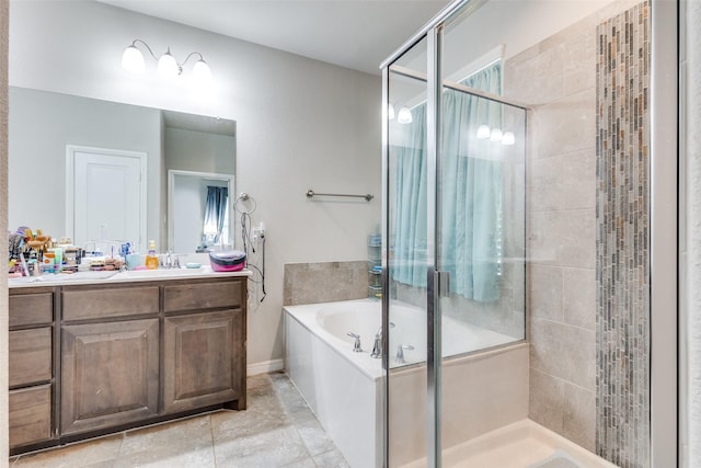 full bath featuring a shower stall, a garden tub, and vanity