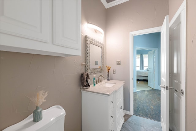523 Buffalo Bend Ct, Murphy, TX 75094 - half bath featuring vanity, toilet, ornamental molding, and ensuite bathroom