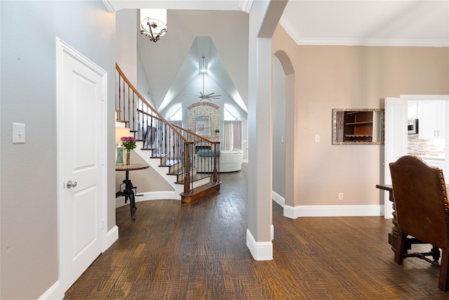 523 Buffalo Bend Ct, Murphy, TX 75094 - entryway with arched walkways, stairs, a ceiling fan, baseboards, and wood finished floors