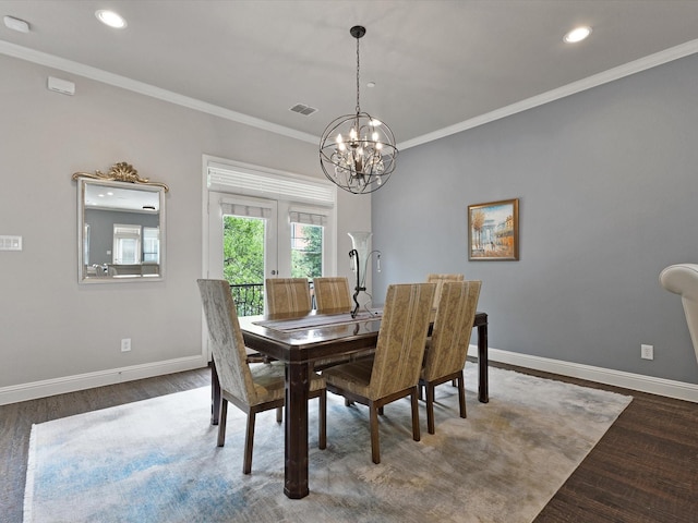dining space with visible vents, wood finished floors, baseboards, a notable chandelier, and recessed lighting