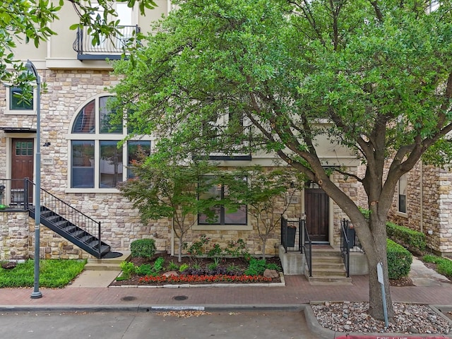 view of front of home featuring stone siding