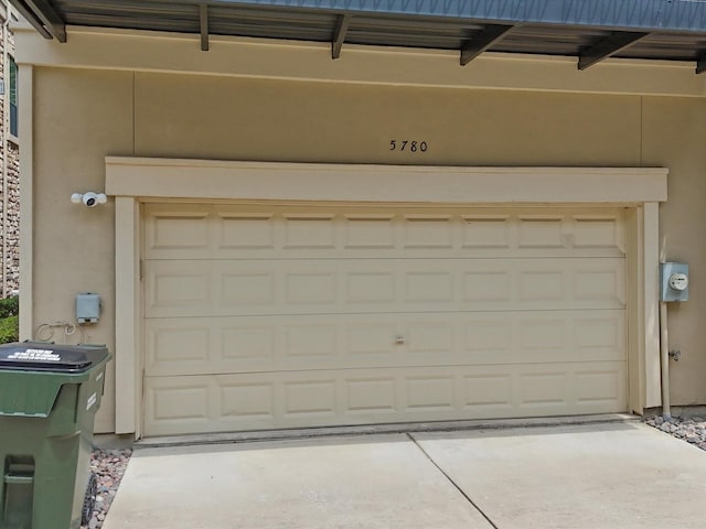 garage featuring driveway