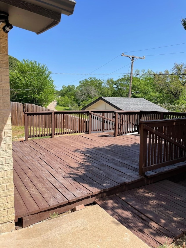 wooden deck featuring fence