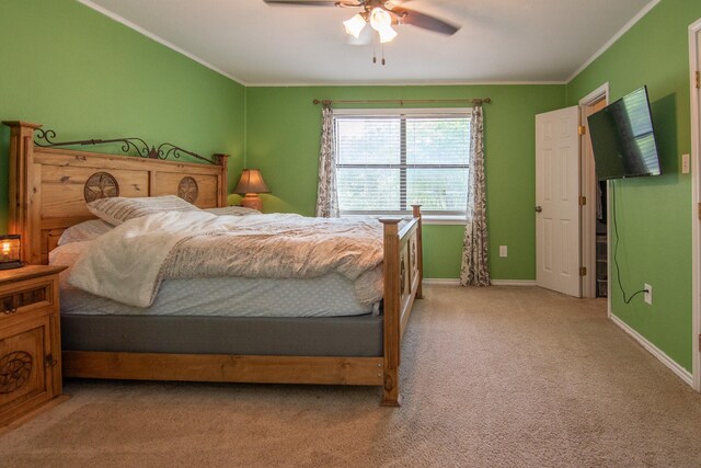 503 W College St, Rising Star, TX 76471 - bedroom with carpet flooring, baseboards, ornamental molding, and ceiling fan