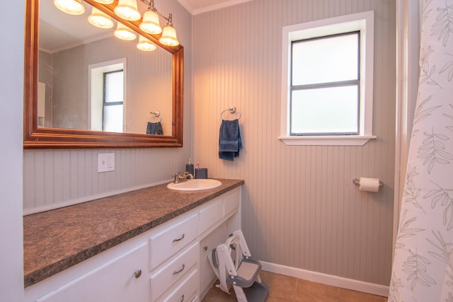 503 W College St, Rising Star, TX 76471 - full bath featuring a wealth of natural light, vanity, baseboards, and ornamental molding