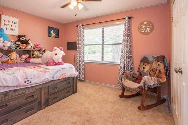 503 W College St, Rising Star, TX 76471 - carpeted bedroom featuring baseboards and a ceiling fan