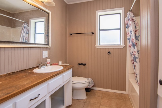 503 W College St, Rising Star, TX 76471 - bathroom featuring vanity, ornamental molding, tile patterned floors, shower / tub combo with curtain, and toilet