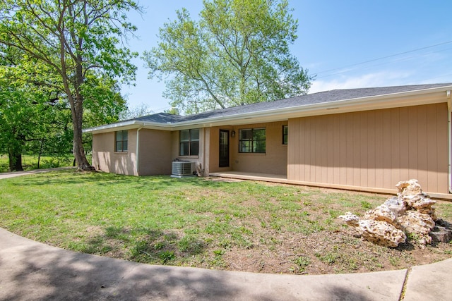 503 W College St, Rising Star, TX 76471 - rear view of house featuring a yard and central AC