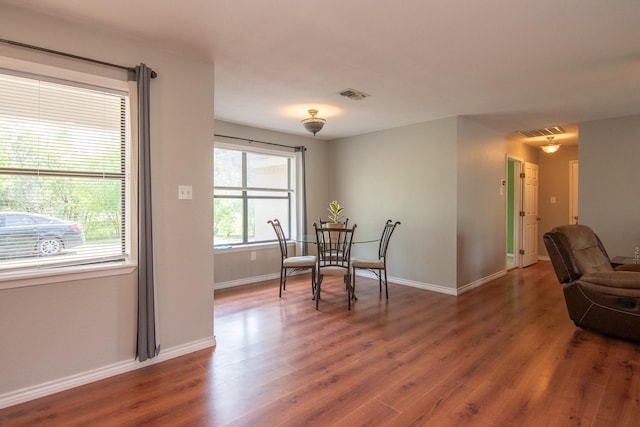 503 W College St, Rising Star, TX 76471 - interior space featuring visible vents, baseboards, and wood finished floors