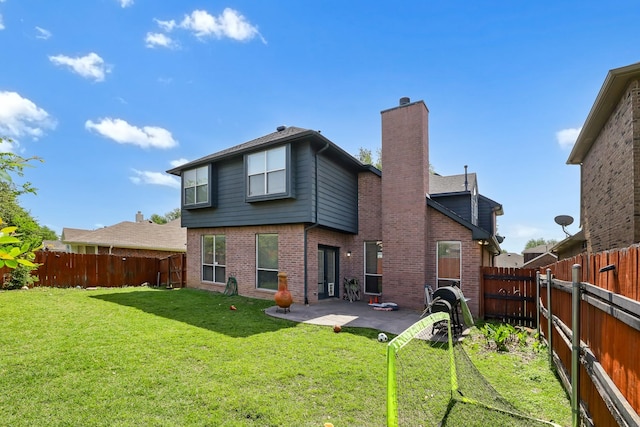 2313 Suntree, Flower Mound, TX 75022 - back of house with a chimney, a patio, and brick siding