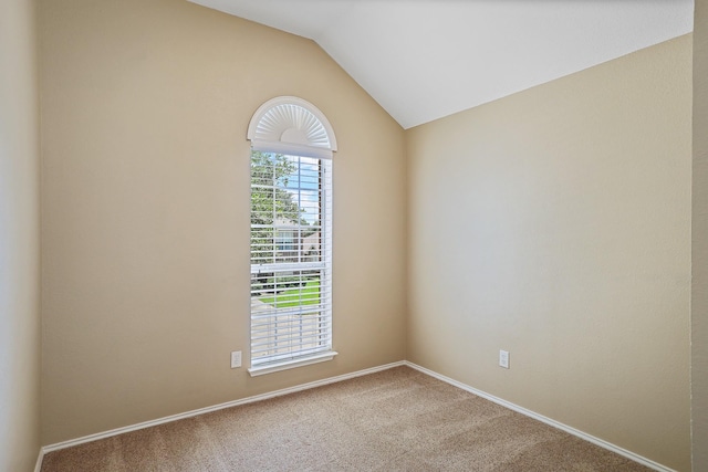 2313 Suntree, Flower Mound, TX 75022 - carpeted empty room with vaulted ceiling and baseboards