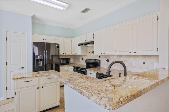 2313 Suntree, Flower Mound, TX 75022 - kitchen featuring black appliances, under cabinet range hood, ornamental molding, decorative backsplash, and a peninsula